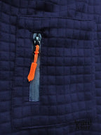 Izan | Polo texturizado con bolsillo en la manga