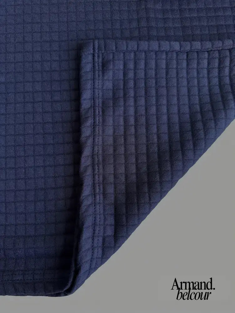 Izan | Polo texturizado con bolsillo en la manga