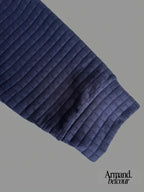 Izan | Polo texturizado con bolsillo en la manga