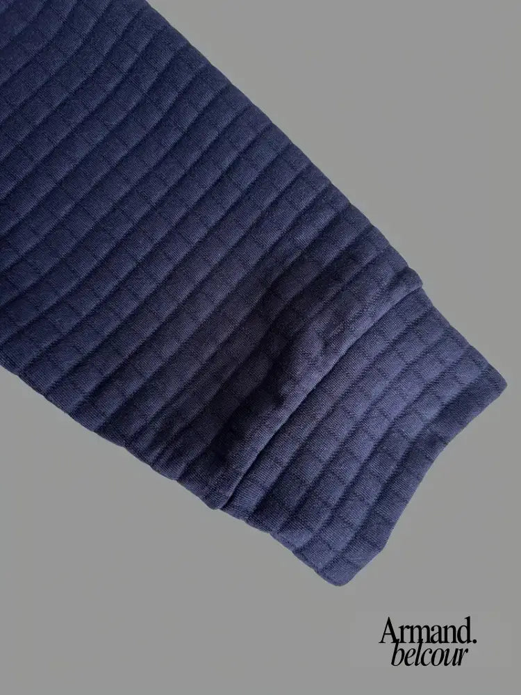 Izan | Polo texturizado con bolsillo en la manga